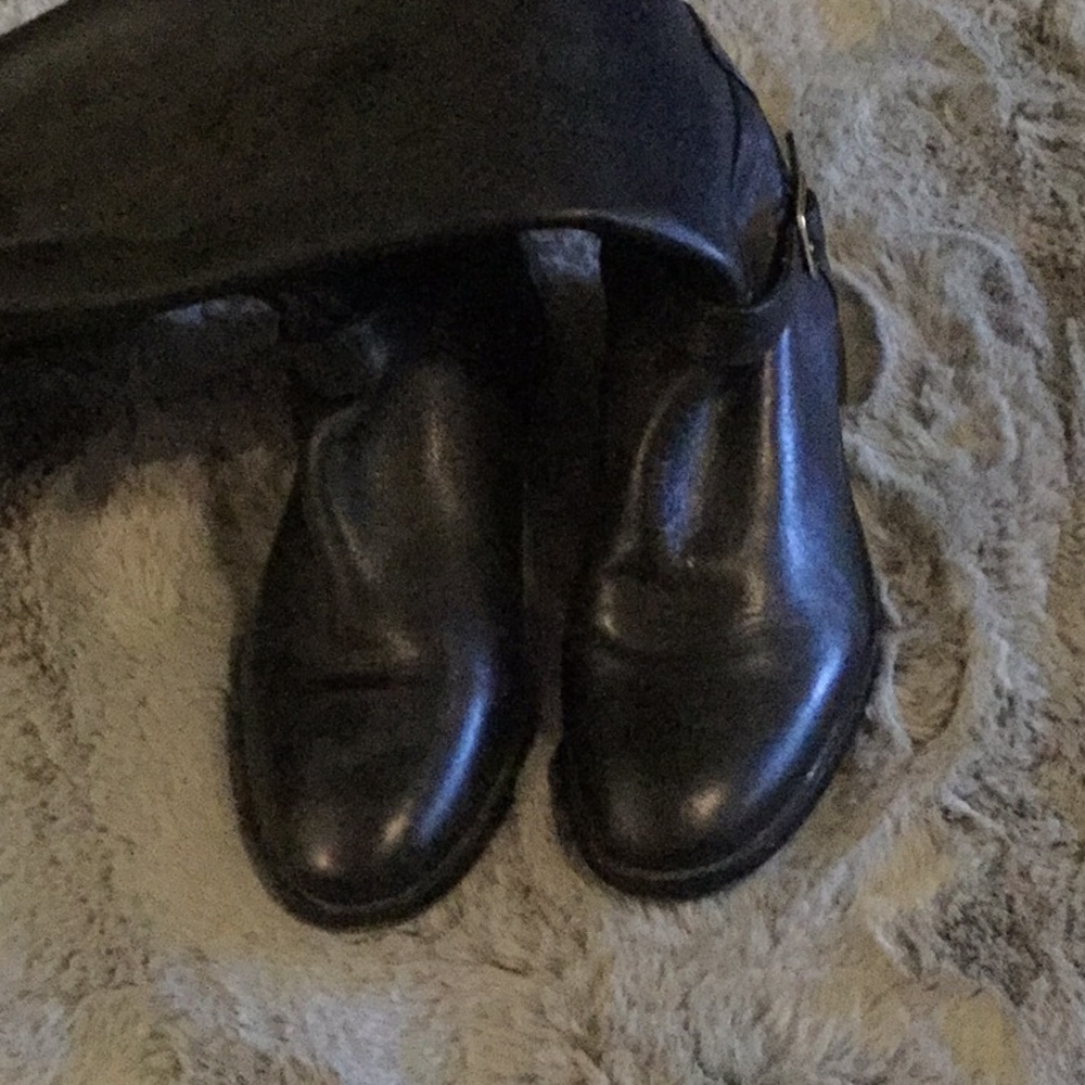 Tall black and Taylor boots